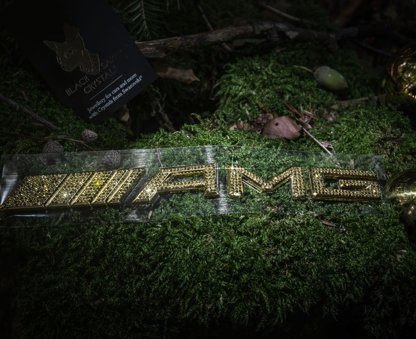Original OEM | Mercedes-Benz AMG Gold 24k Logo | mit original Swarovski®/Preciosa® - Black Saphir Crystals