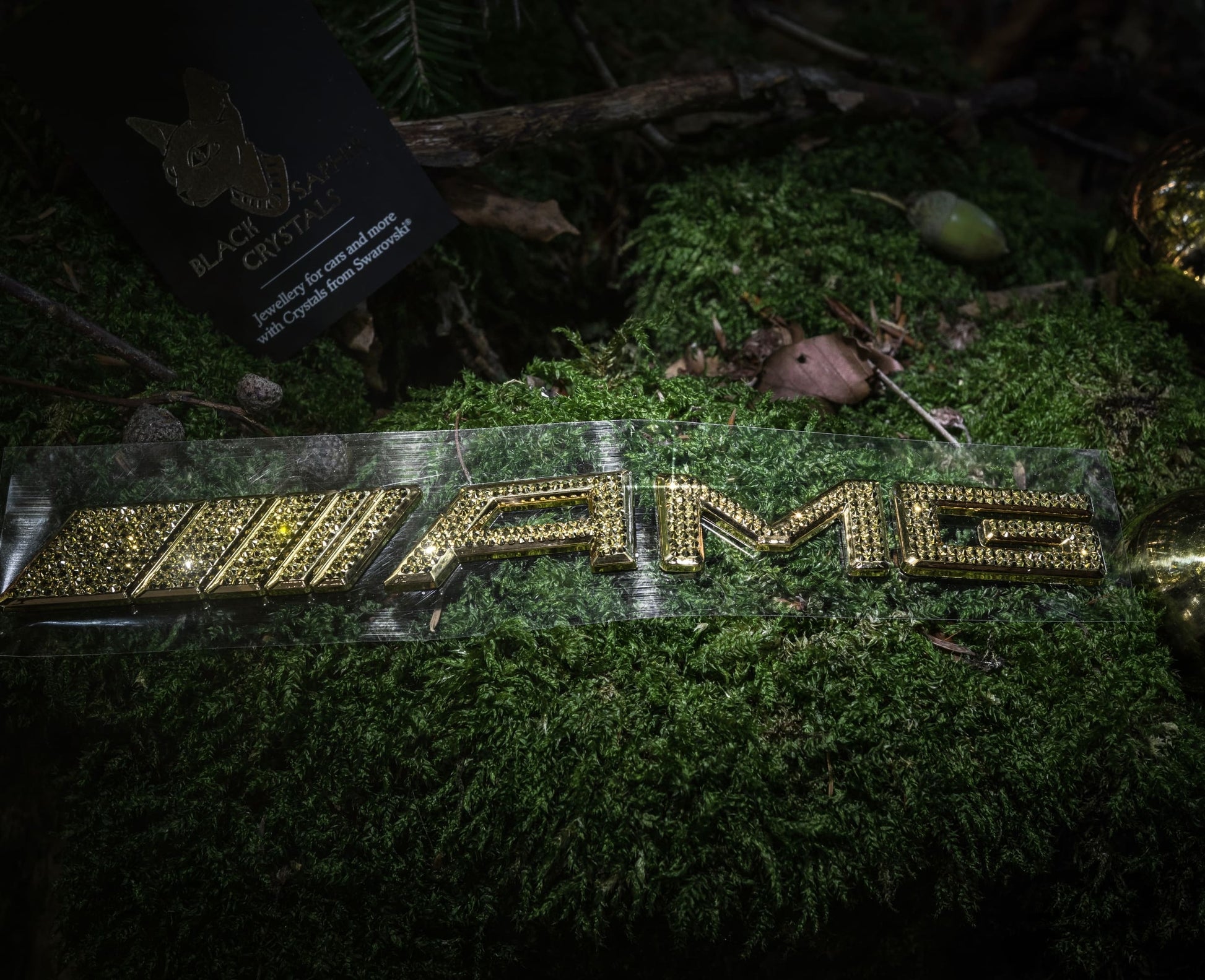 Original OEM | Mercedes-Benz AMG Gold 24k Logo | mit original Swarovski®/Preciosa® - Black Saphir Crystals
