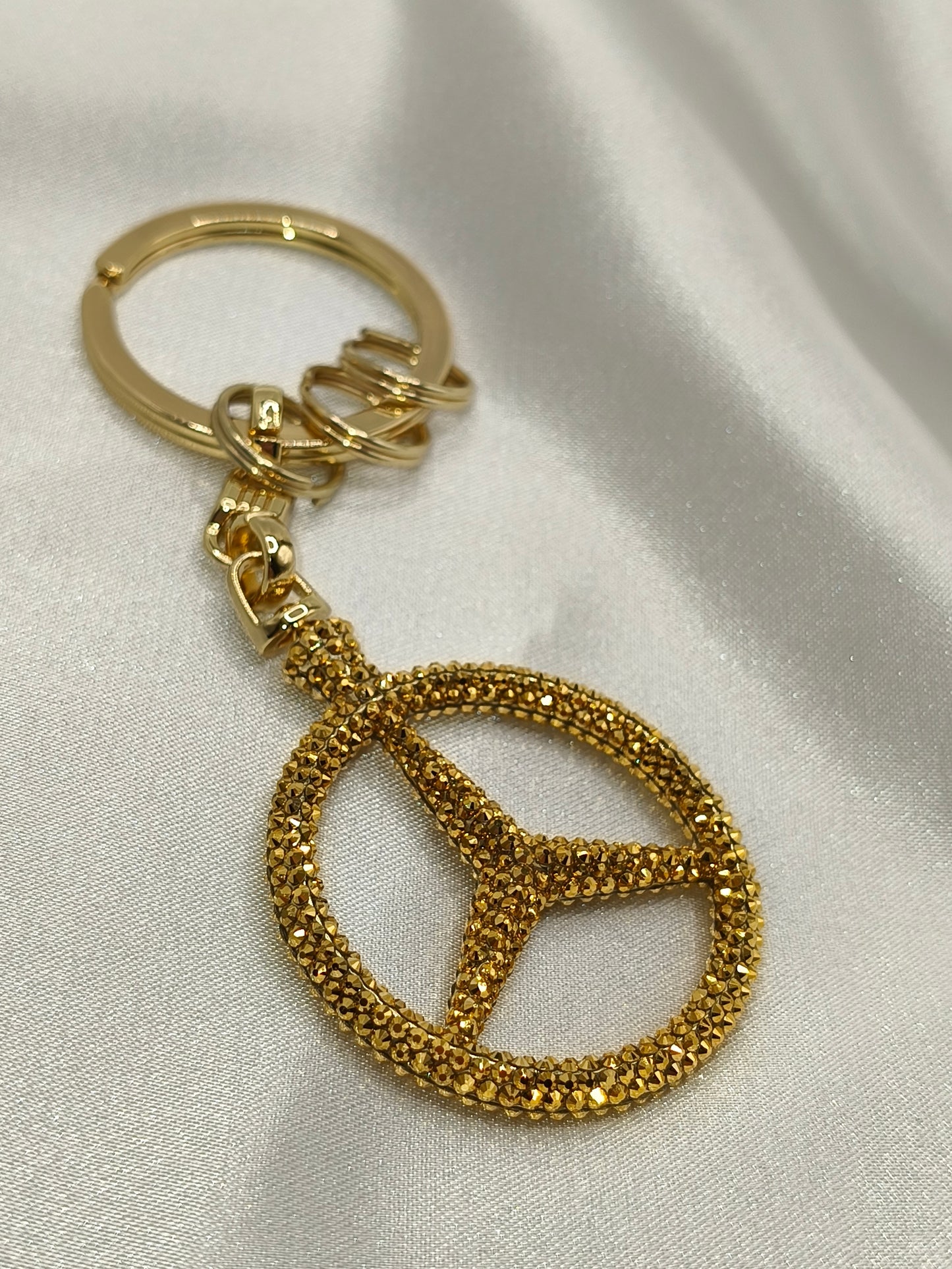 Original OEM | Mercedes-Benz Schlüsselanhänger Gold | mit original Preciosa® Kristallen - Black Saphir Crystals