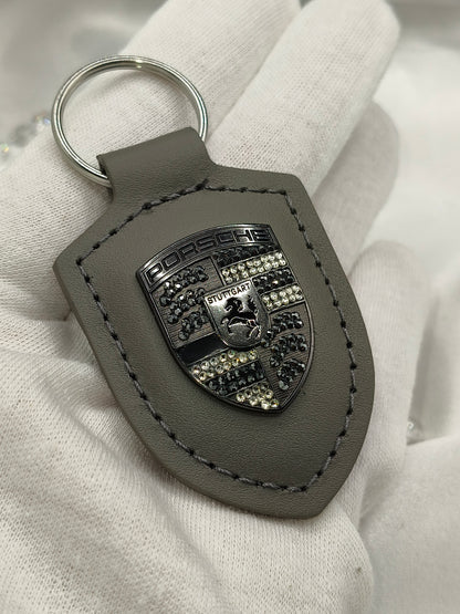 Original OEM | Porsche Turbonit (Limited Edition) grau Logo Emblem Schlüsselanhänger | mit original Preciosa Kristallen® - Black Saphir Crystals
