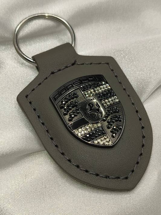 Original OEM | Porsche Turbonit (Limited Edition) grau Logo Emblem Schlüsselanhänger | mit original Preciosa Kristallen® - Black Saphir Crystals
