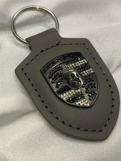 Original OEM | Porsche Turbonit (Limited Edition) grau Logo Emblem Schlüsselanhänger | mit original Preciosa Kristallen® - Black Saphir Crystals