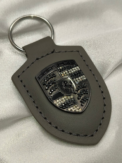 Original OEM | Porsche Turbonit (Limited Edition) grau Logo Emblem Schlüsselanhänger | mit original Preciosa Kristallen® - Black Saphir Crystals