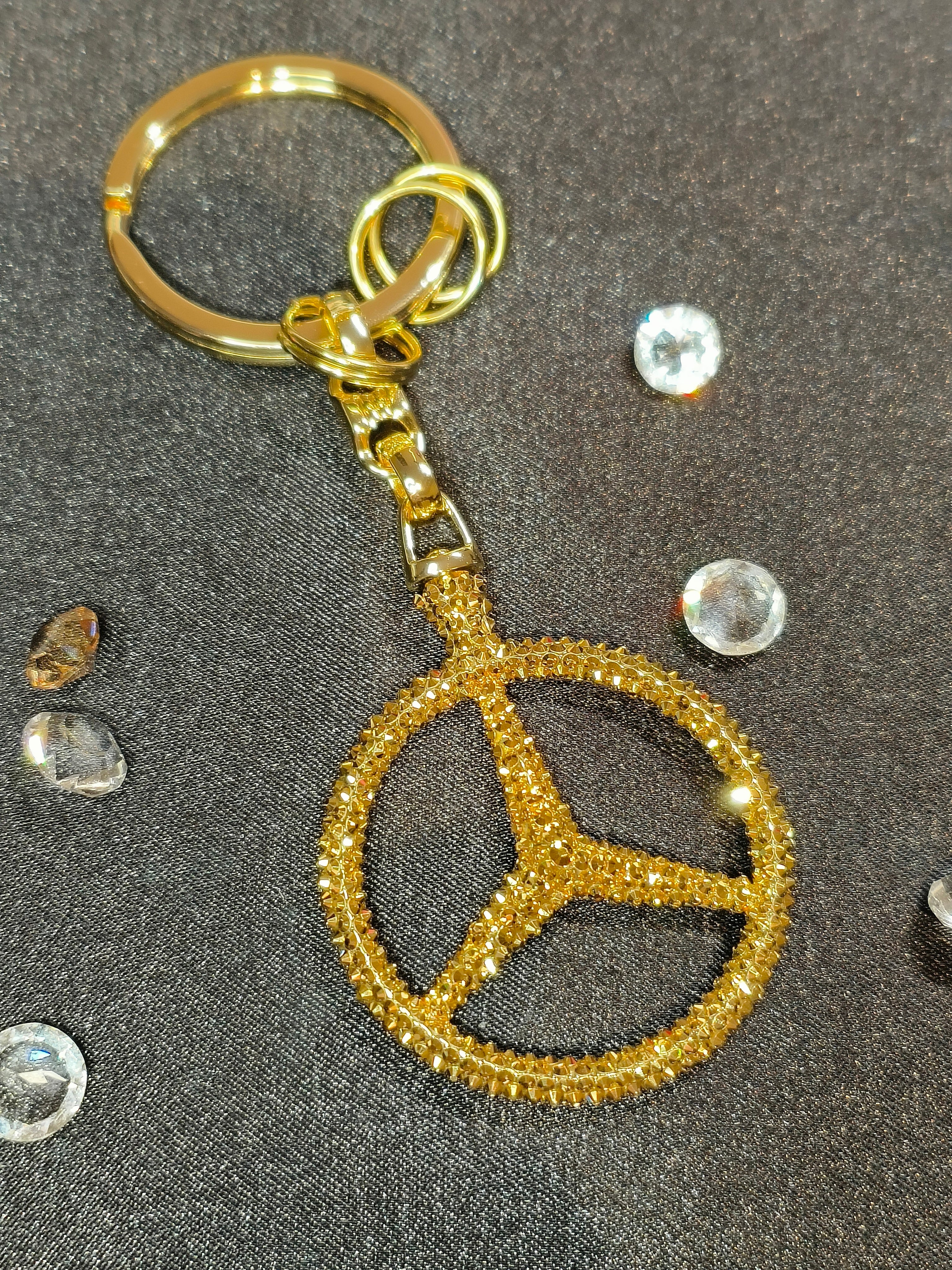 Original OEM | Mercedes-Benz Schlüsselanhänger Gold | mit original Swarovski®/Preciosa® - Black Saphir Crystals