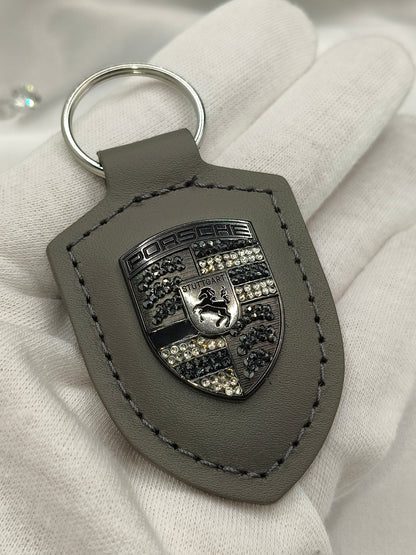 Original OEM | Porsche Turbonit (Limited Edition) grau Logo Emblem Schlüsselanhänger | mit original Preciosa Kristallen® - Black Saphir Crystals