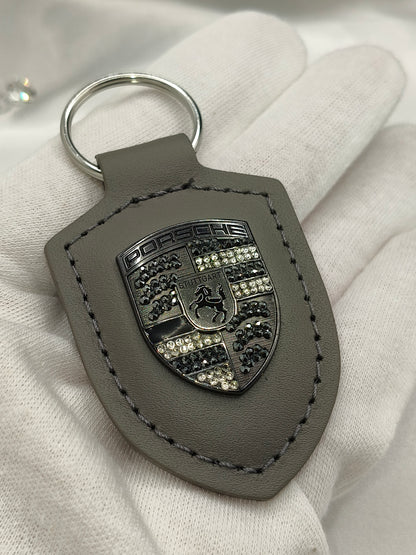 Original OEM | Porsche Turbonit (Limited Edition) grau Logo Emblem Schlüsselanhänger | mit original Preciosa Kristallen® - Black Saphir Crystals
