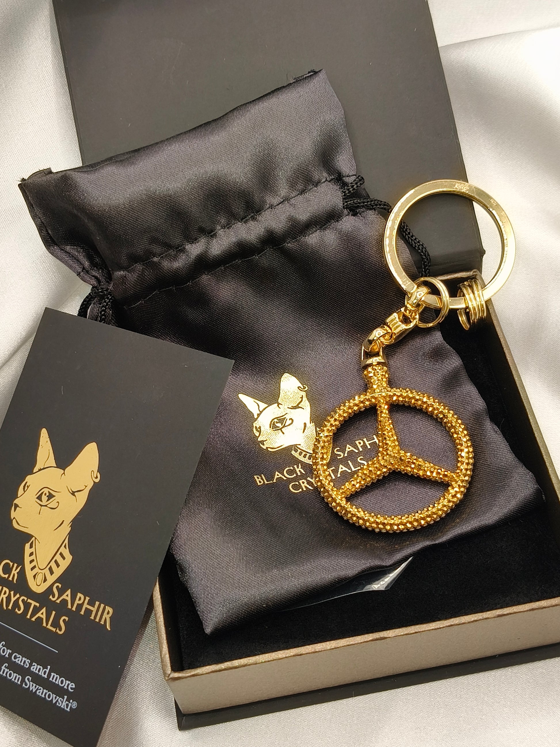 Original OEM | Mercedes-Benz Schlüsselanhänger Gold | mit original Preciosa® Kristallen - Black Saphir Crystals