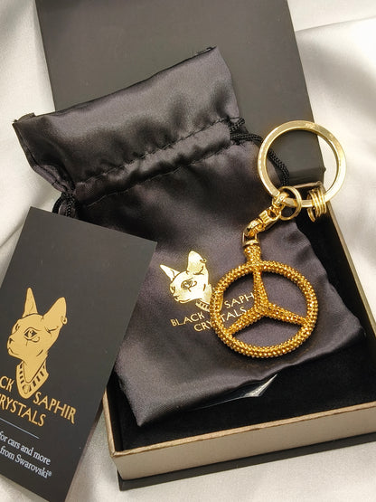 Original OEM | Mercedes-Benz Schlüsselanhänger Gold | mit original Preciosa® Kristallen - Black Saphir Crystals