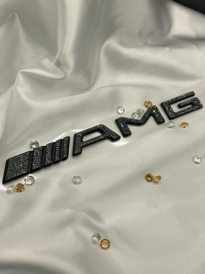 Original OEM | Mercedes-Benz AMG Logo Emblem | mit original Preciosa® Kristallen - Black Saphir Crystals