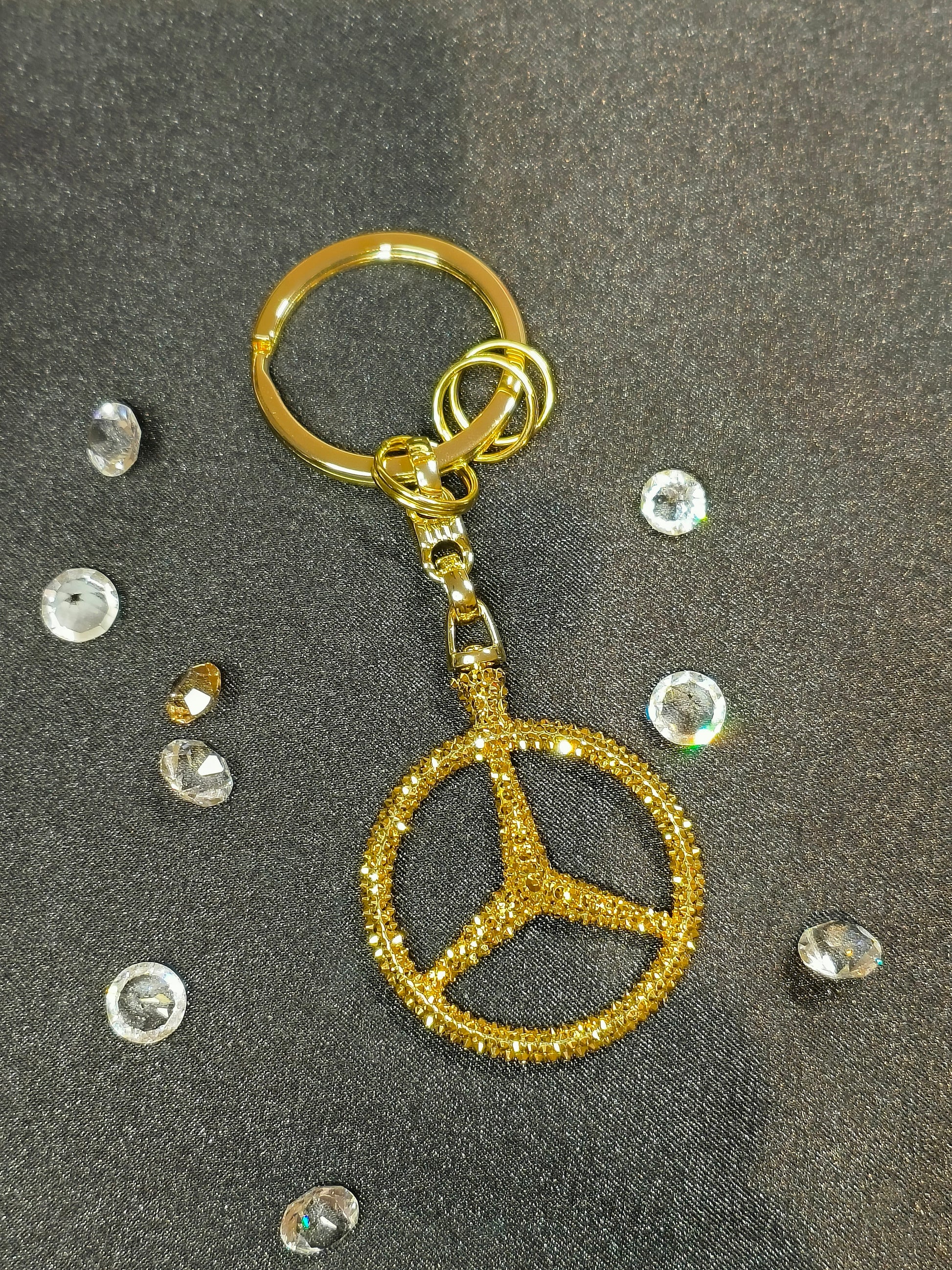 Original OEM | Mercedes-Benz Schlüsselanhänger Gold | mit original Swarovski®/Preciosa® - Black Saphir Crystals