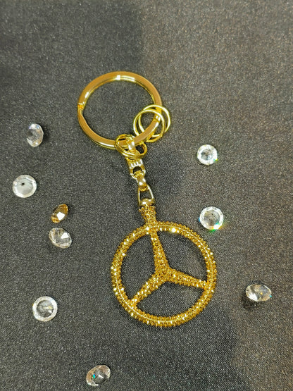 Original OEM | Mercedes-Benz Schlüsselanhänger Gold | mit original Swarovski®/Preciosa® - Black Saphir Crystals