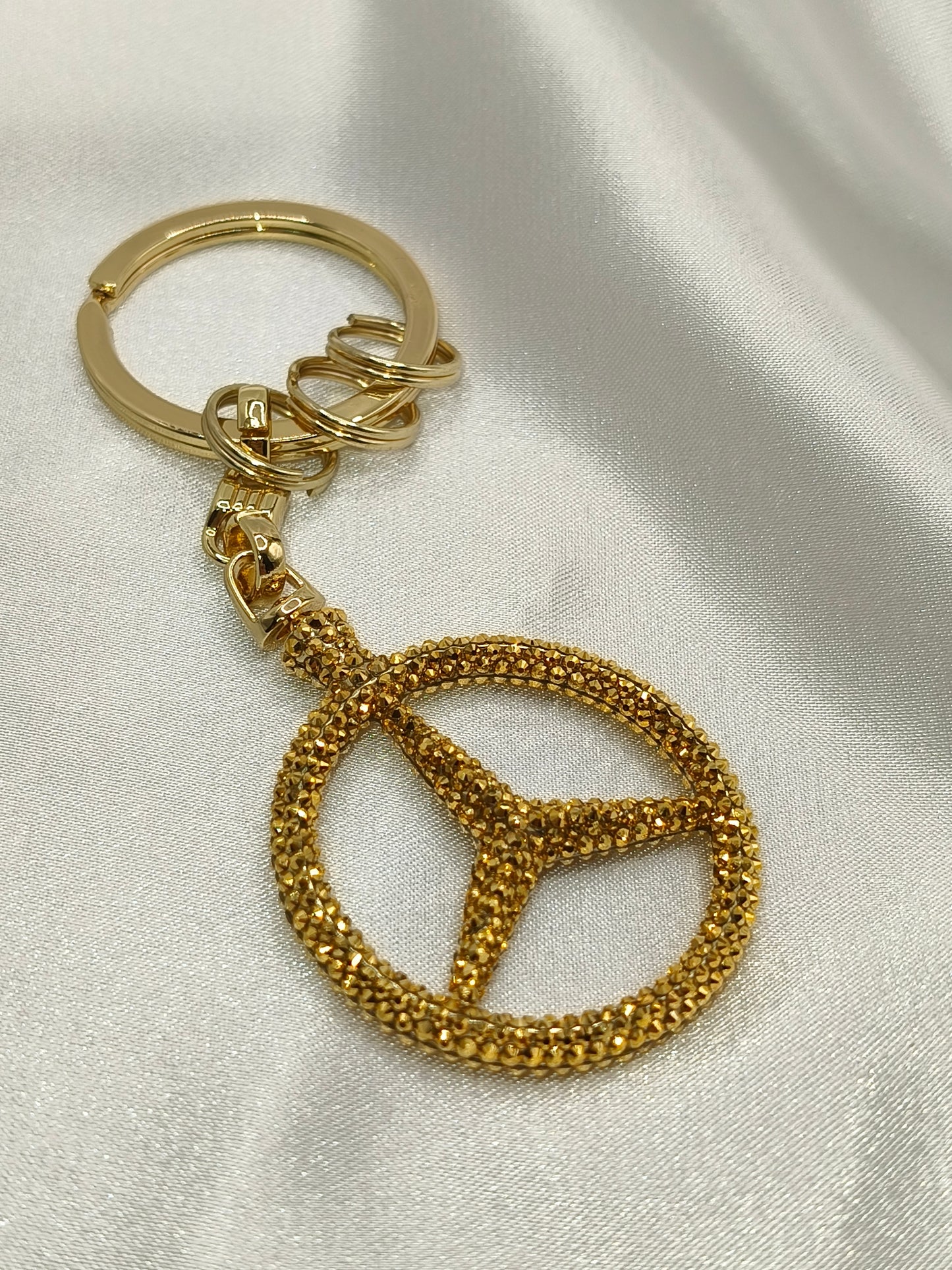Original OEM | Mercedes-Benz Schlüsselanhänger Gold | mit original Preciosa® Kristallen - Black Saphir Crystals