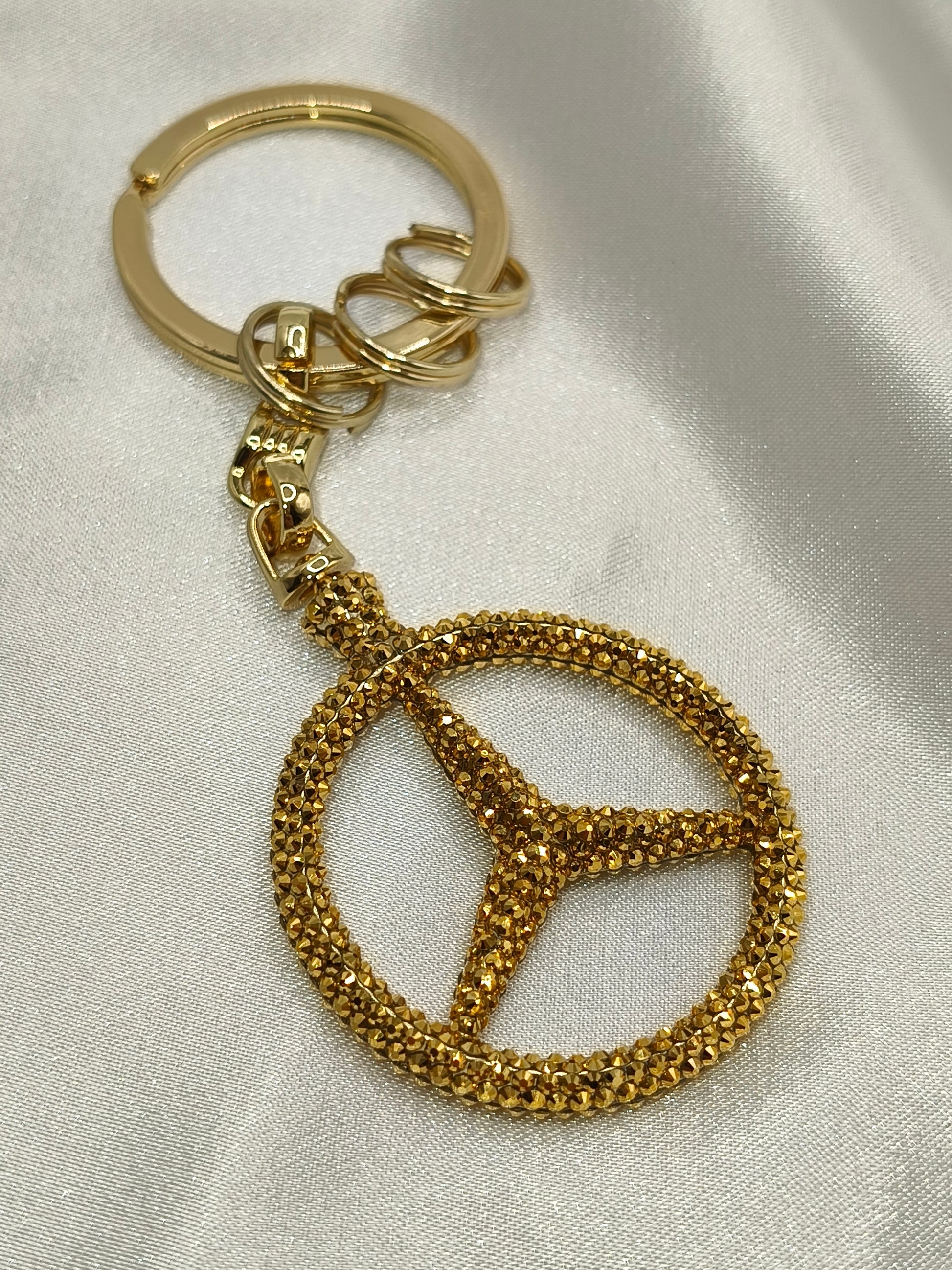 Original OEM | Mercedes-Benz Schlüsselanhänger Gold | mit original Preciosa® Kristallen - Black Saphir Crystals