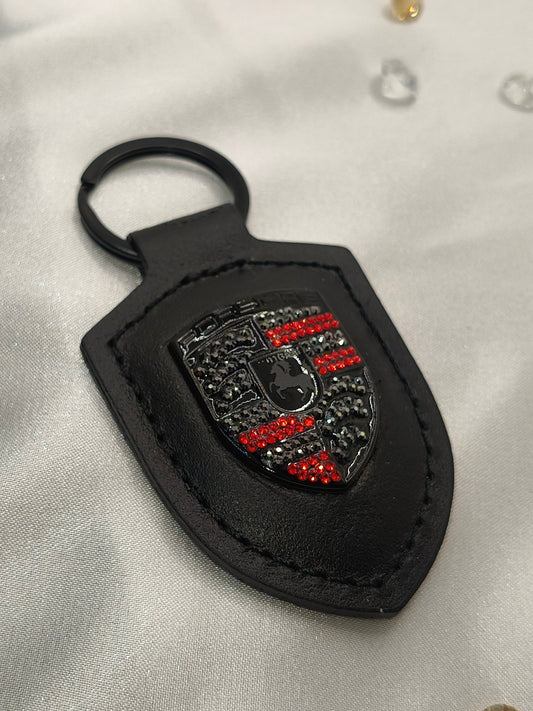 Original OEM | Porsche Logo Schwarz lackiert Emblem Schlüsselanhänger | mit original Preciosa Kristallen® - Black Saphir Crystals