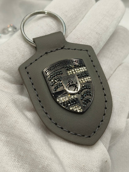 Original OEM | Porsche Turbonit (Limited Edition) grau Logo Emblem Schlüsselanhänger | mit original Preciosa Kristallen® - Black Saphir Crystals