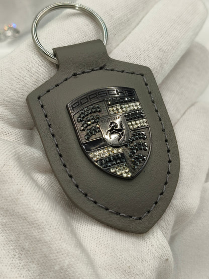Original OEM | Porsche Turbonit (Limited Edition) grau Logo Emblem Schlüsselanhänger | mit original Preciosa Kristallen® - Black Saphir Crystals